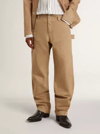 Pantaloni da uomo beige con toppe