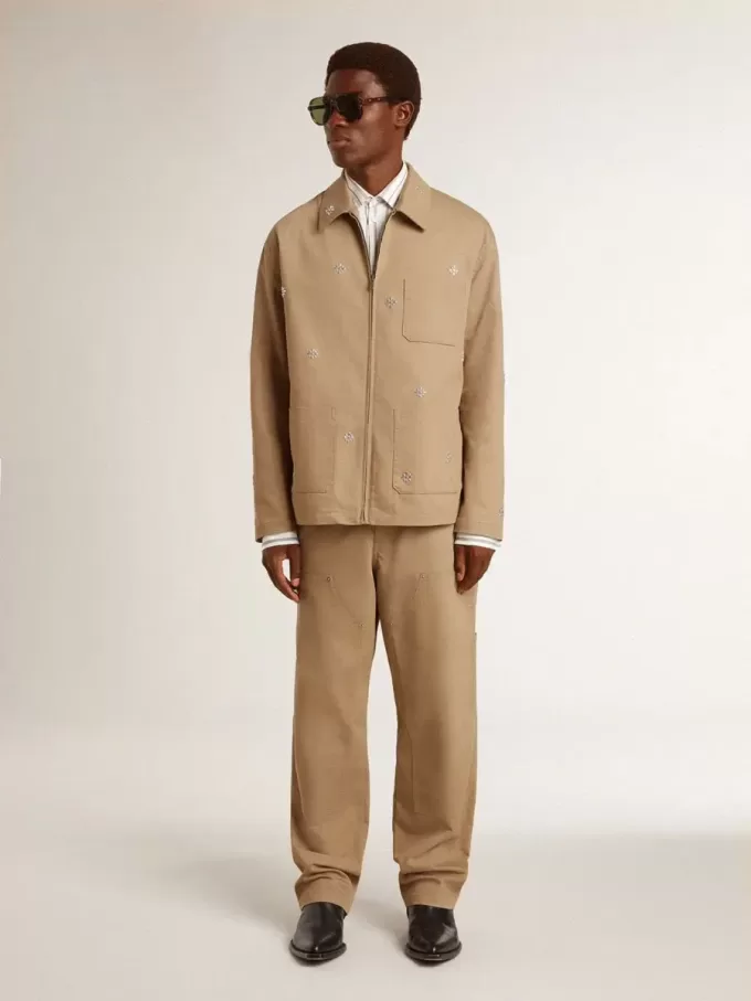 Pantaloni da uomo beige con toppe