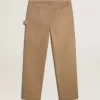 Pantaloni da uomo beige con toppe
