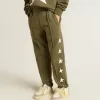 Pantaloni jogging da bambino verde militare con stelle bianche