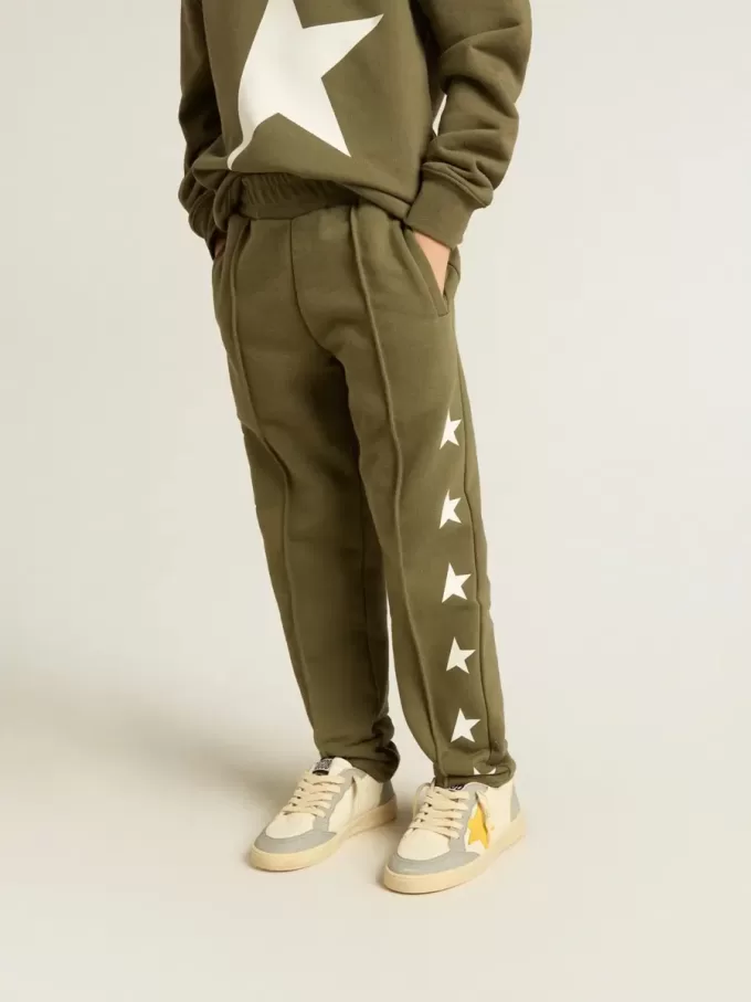 Pantaloni jogging da bambino verde militare con stelle bianche