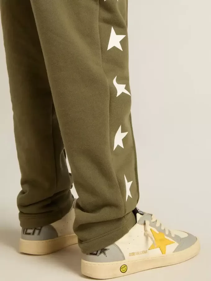 Pantaloni jogging da bambino verde militare con stelle bianche