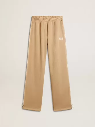 Pantaloni jogging da donna beige chiaro con logo bianco