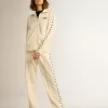 Pantaloni jogging da donna bianchi con stelle sui lati Pantaloni jogging da donna bianchi con stelle sui lati