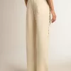 Pantaloni jogging da donna bianchi con stelle sui lati Pantaloni jogging da donna bianchi con stelle sui lati