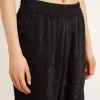 Pantaloni jogging da donna neri con stampa toile de jouy tono su tono
