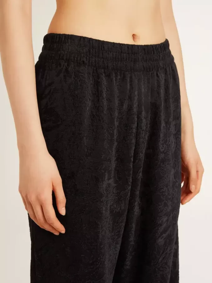 Pantaloni jogging da donna neri con stampa toile de jouy tono su tono