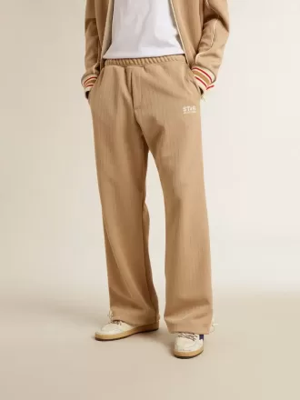Pantaloni jogging da uomo beige chiaro con logo bianco
