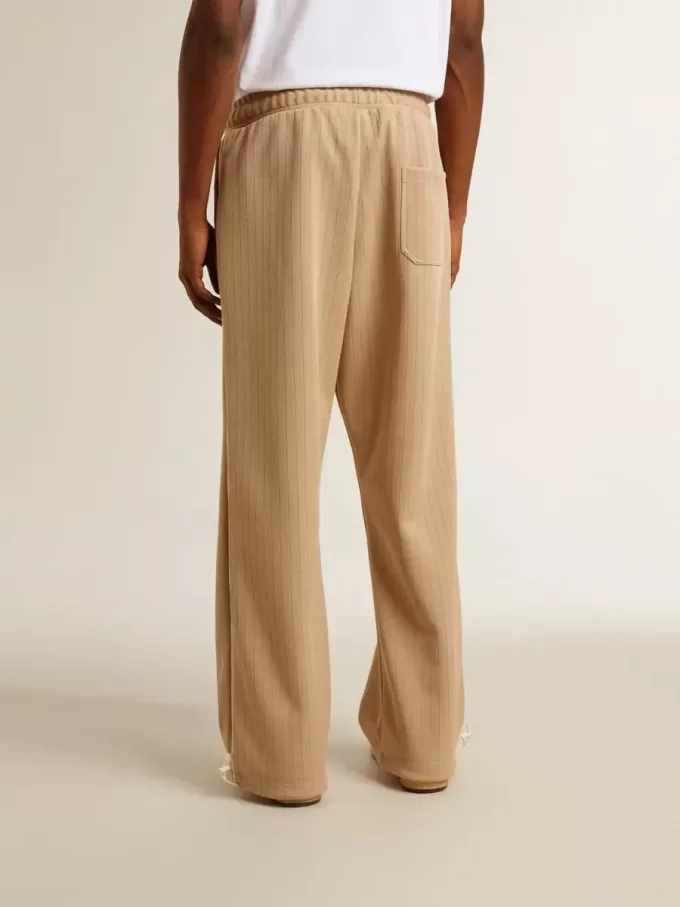 Pantaloni jogging da uomo beige chiaro con logo bianco
