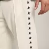 Pantaloni jogging da uomo bianchi con stelle nere sui lati Pantaloni jogging da uomo bianchi con stelle nere sui lati