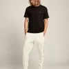 Pantaloni jogging da uomo bianchi con stelle nere sui lati Pantaloni jogging da uomo bianchi con stelle nere sui lati