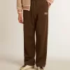 Pantaloni jogging da uomo verde militare con logo bianco Pantaloni jogging da uomo verde militare con logo bianco