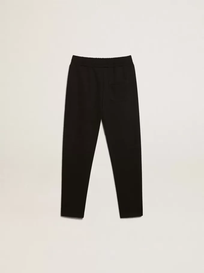 Pantaloni jogging neri da bambino con stelle bianche