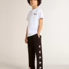 Pantaloni jogging neri da bambino con stelle bianche