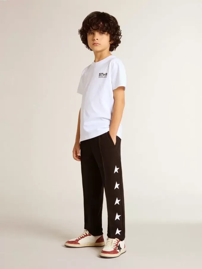 Pantaloni jogging neri da bambino con stelle bianche