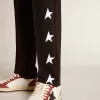 Pantaloni jogging neri da bambino con stelle bianche