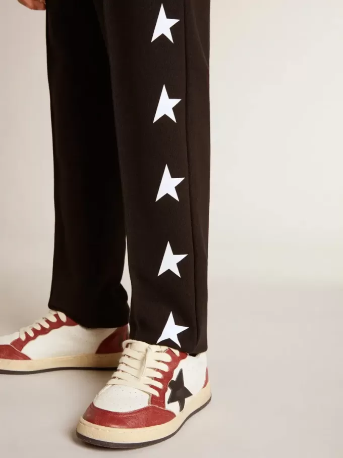 Pantaloni jogging neri da bambino con stelle bianche
