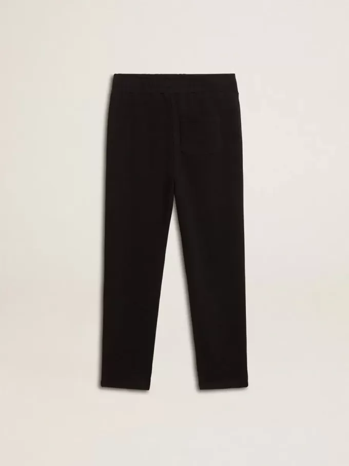 Pantaloni jogging neri da bambino con stelle bianche