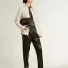 Pantaloni jogging neri in pelle nappa con zip alla base Pantaloni jogging neri in pelle nappa con zip alla base