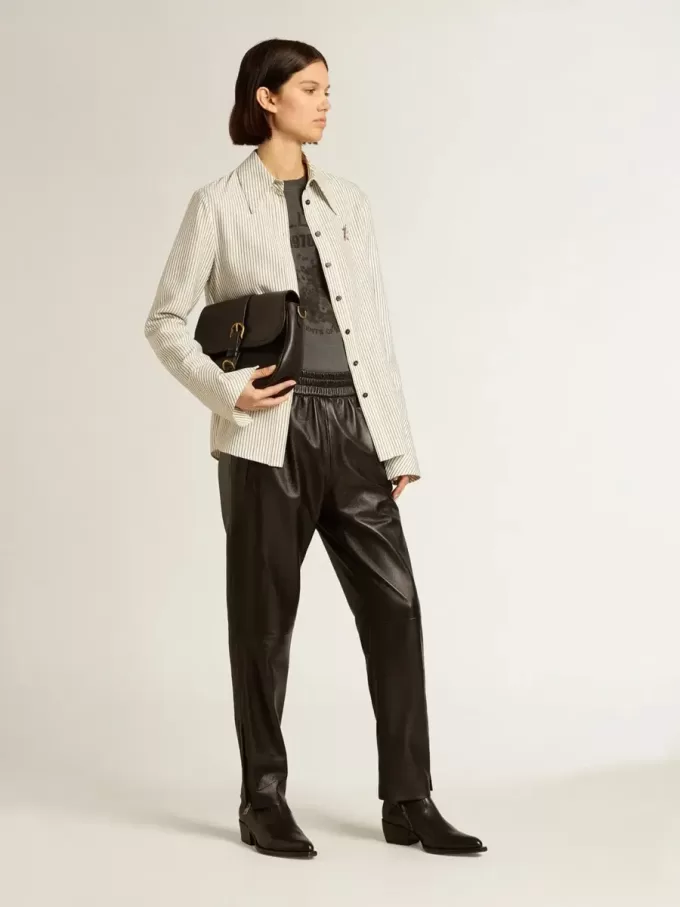 Pantaloni jogging neri in pelle nappa con zip alla base Pantaloni jogging neri in pelle nappa con zip alla base