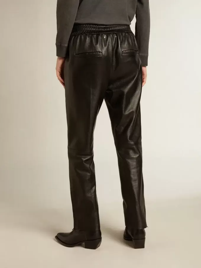 Pantaloni jogging neri in pelle nappa con zip alla base Pantaloni jogging neri in pelle nappa con zip alla base