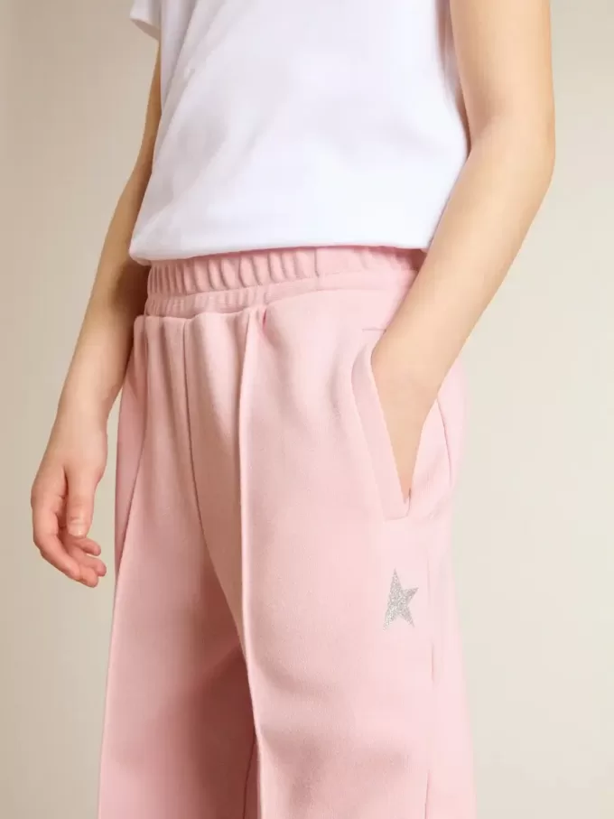 Pantaloni jogging rosa con stella glitterata sul davanti Pantaloni jogging rosa con stella glitterata sul davanti