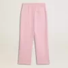 Pantaloni jogging rosa con stella glitterata sul davanti Pantaloni jogging rosa con stella glitterata sul davanti