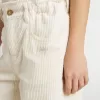 Pantaloni larghi a coste color crema con ricami per bambina Pantaloni larghi a coste color crema con ricami per bambina