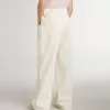 Pantaloni larghi a coste color crema con ricami per bambina Pantaloni larghi a coste color crema con ricami per bambina