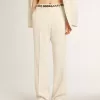 Pantaloni larghi da donna in tessuto sartoriale bianco consumato Pantaloni larghi da donna in tessuto sartoriale bianco consumato