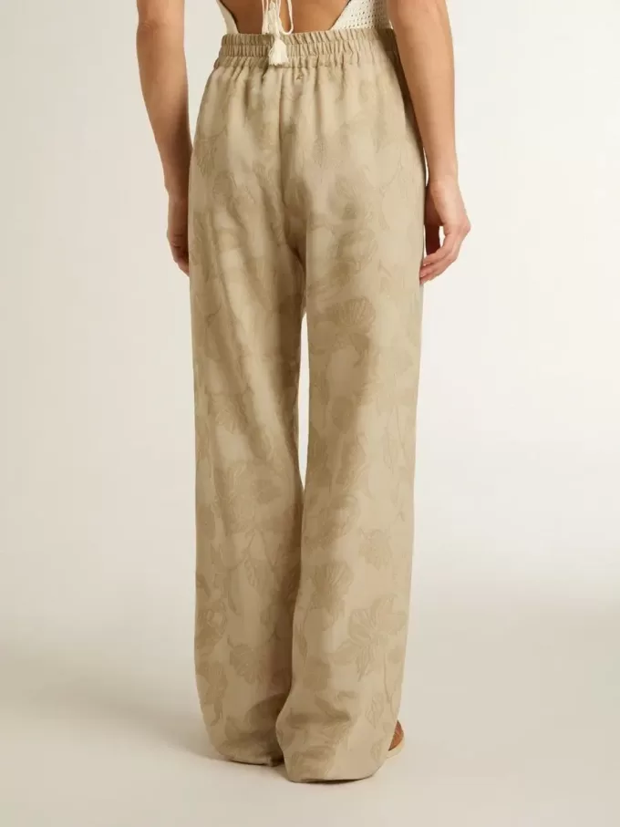 Pantaloni pigiama da donna in jacquard beige con motivo floreale