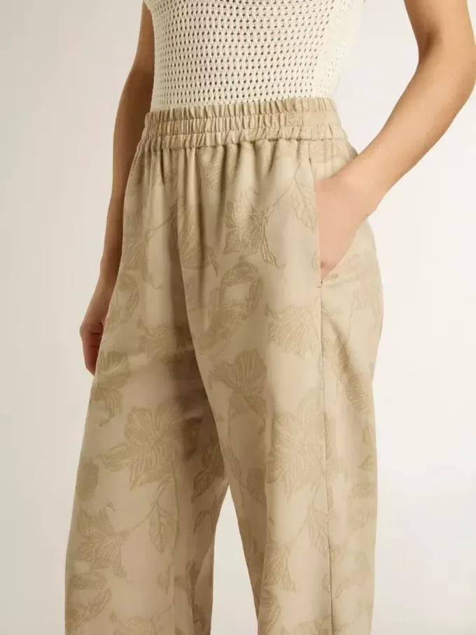 Pantaloni pigiama da donna in jacquard beige con motivo floreale