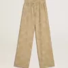 Pantaloni pigiama da donna in jacquard beige con motivo floreale