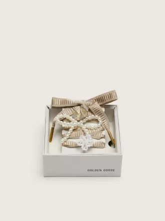 Pelle Lacci ricamati beige “Sparkling” con charm applicati in perline e charm dorato