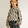 Polo da bambina con stampa geometrica Polo da bambina con stampa geometrica