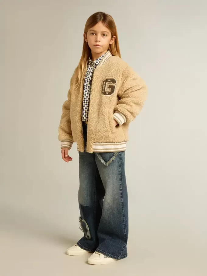 Polo da bambina con stampa geometrica Polo da bambina con stampa geometrica