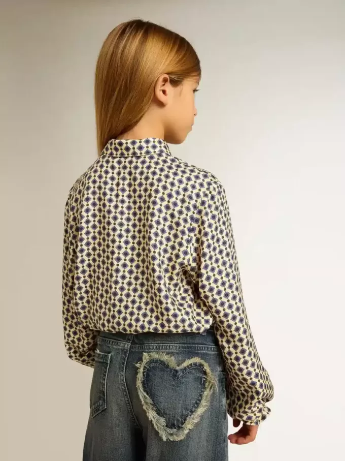 Polo da bambina con stampa geometrica Polo da bambina con stampa geometrica