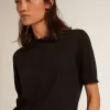 Polo da donna in lana merino nera Polo da donna in lana merino nera