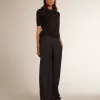 Polo da donna in lana merino nera Polo da donna in lana merino nera