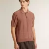 Polo da uomo color mattone con logo ricamato. Polo da uomo color mattone con logo ricamato.