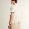 Polo da uomo in maglia traforata bianca con dettagli a righe bordeaux Polo da uomo in maglia traforata bianca con dettagli a righe bordeaux
