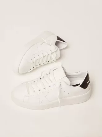 Purestar da donna con linguetta nera sul tallone Purestar da donna con linguetta nera sul tallone