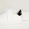Purestar da donna con stella in pelle e linguetta sul tallone in vernice nera Purestar da donna con stella in pelle e linguetta sul tallone in vernice nera