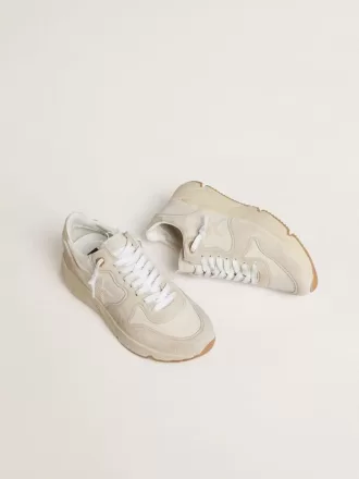 Running Sole da donna in tela con stella beige e linguetta sul tallone in pelle metallizzata platino Running Sole da donna in tela con stella beige e linguetta sul tallone in pelle metallizzata platino