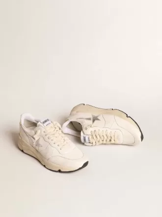 Running Sole in nappa con stella argentata e linguetta sul tallone in pelle dorata Running Sole in nappa con stella argentata e linguetta sul tallone in pelle dorata