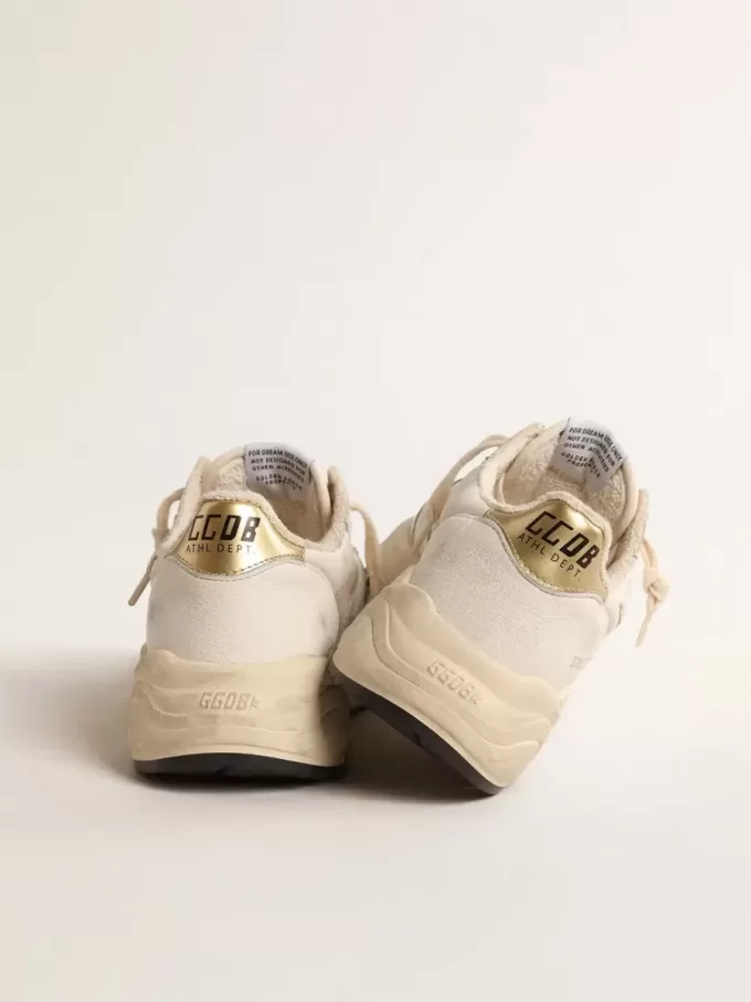 Running Sole LTD da donna in nappa con stella in pelle scamosciata e linguetta dorata sul tallone Running Sole LTD da donna in nappa con stella in pelle scamosciata e linguetta dorata sul tallone
