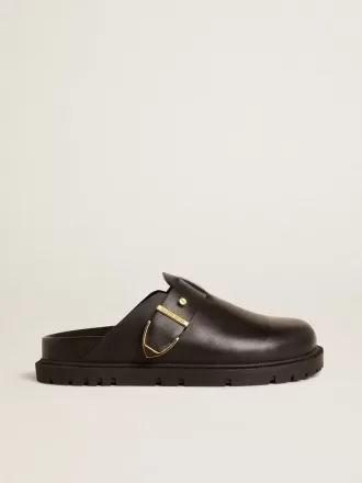 Sabot Lucy da donna in pelle nera lucida con fibbia metallica dorata Sabot Lucy da donna in pelle nera lucida con fibbia metallica dorata