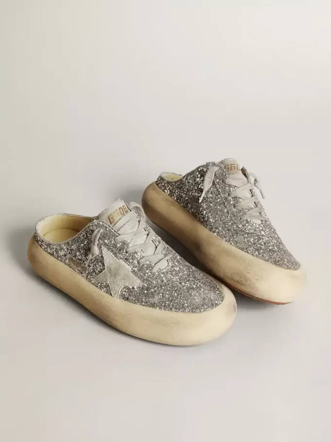 Sabot Space-Star da donna in glitter con stella grigio ghiaccio e linguetta Sabot Space-Star da donna in glitter con stella grigio ghiaccio e linguetta
