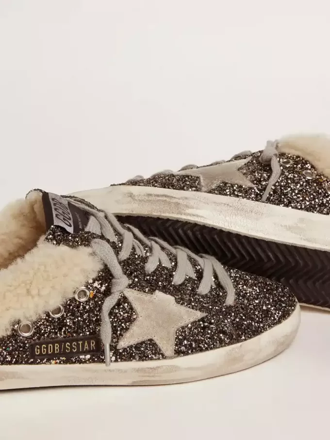 Sabot Super-Star da donna con glitter e interno in shearling Sabot Super-Star da donna con glitter e interno in shearling