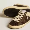 Sabot Super-Star glitterati con stella marrone e fodera in shearling Sabot Super-Star glitterati con stella marrone e fodera in shearling